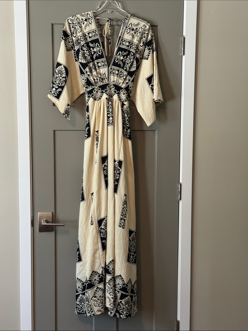 Aakaa Cream and Black Printed V‑Neck Maxi Dress